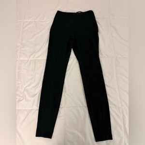lululemon black front seam leggings with back cut out and mini pocket